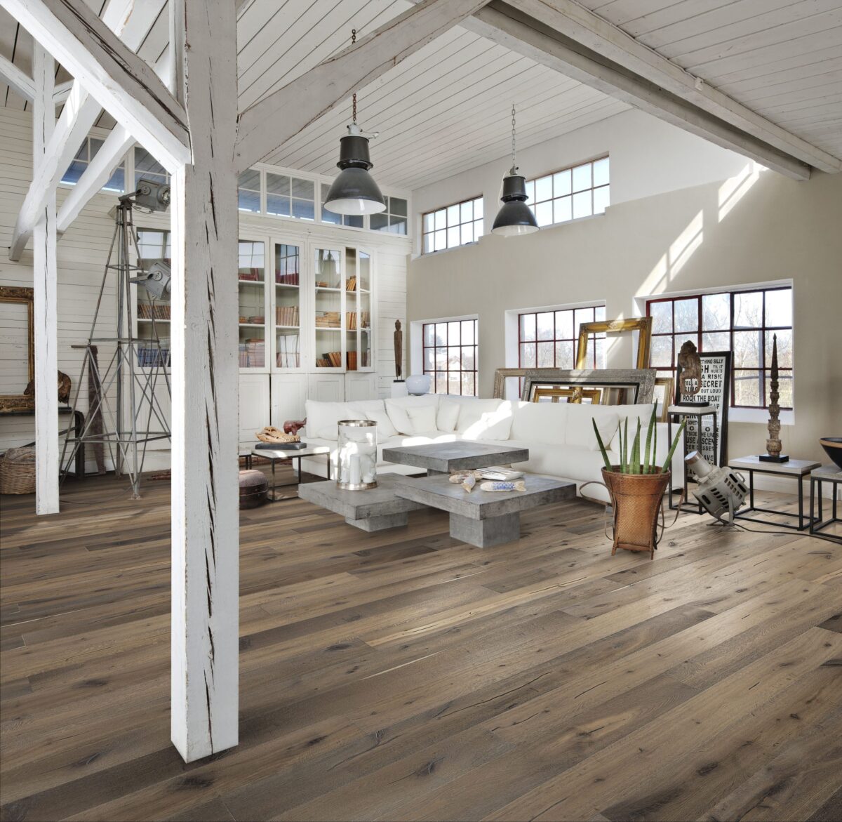 Decorated indoor room with natural lighting and Kahrs Oak Sture Prefinished Hardwood.