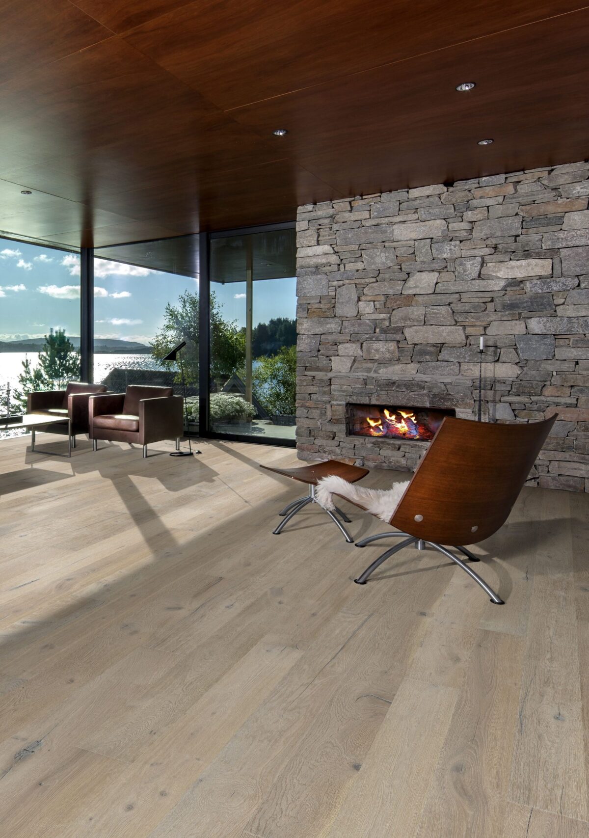 Decorated indoor room with natural lighting and Kahrs Oak Gustaf Prefinished Hardwood.