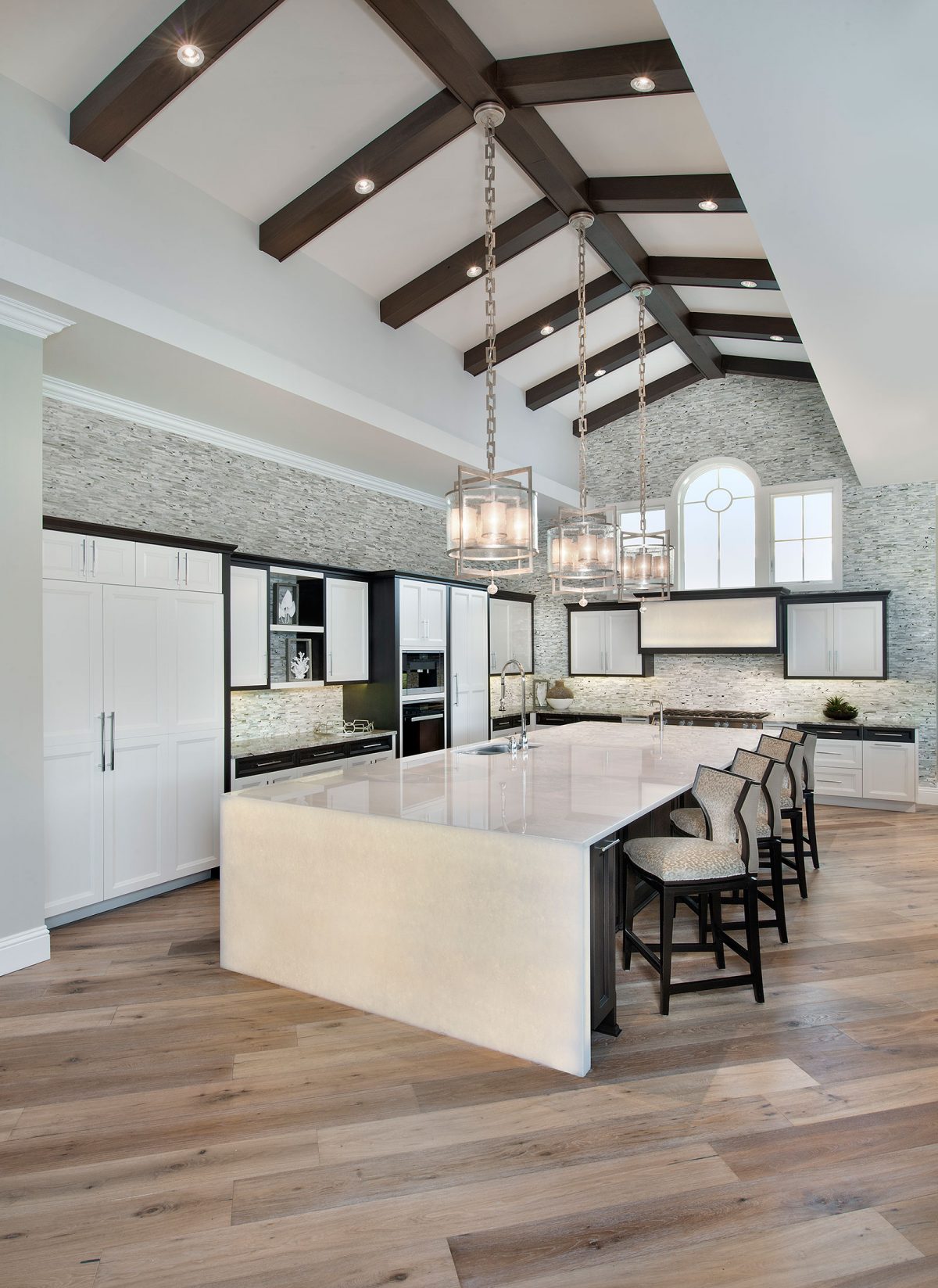 Decorated kitchen space with DuChateau White Patina Chateau Prefinished Hardwood.