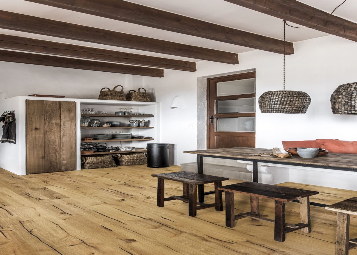 Decorated dining space with Kahrs Finnveden Prefinished Hardwood.