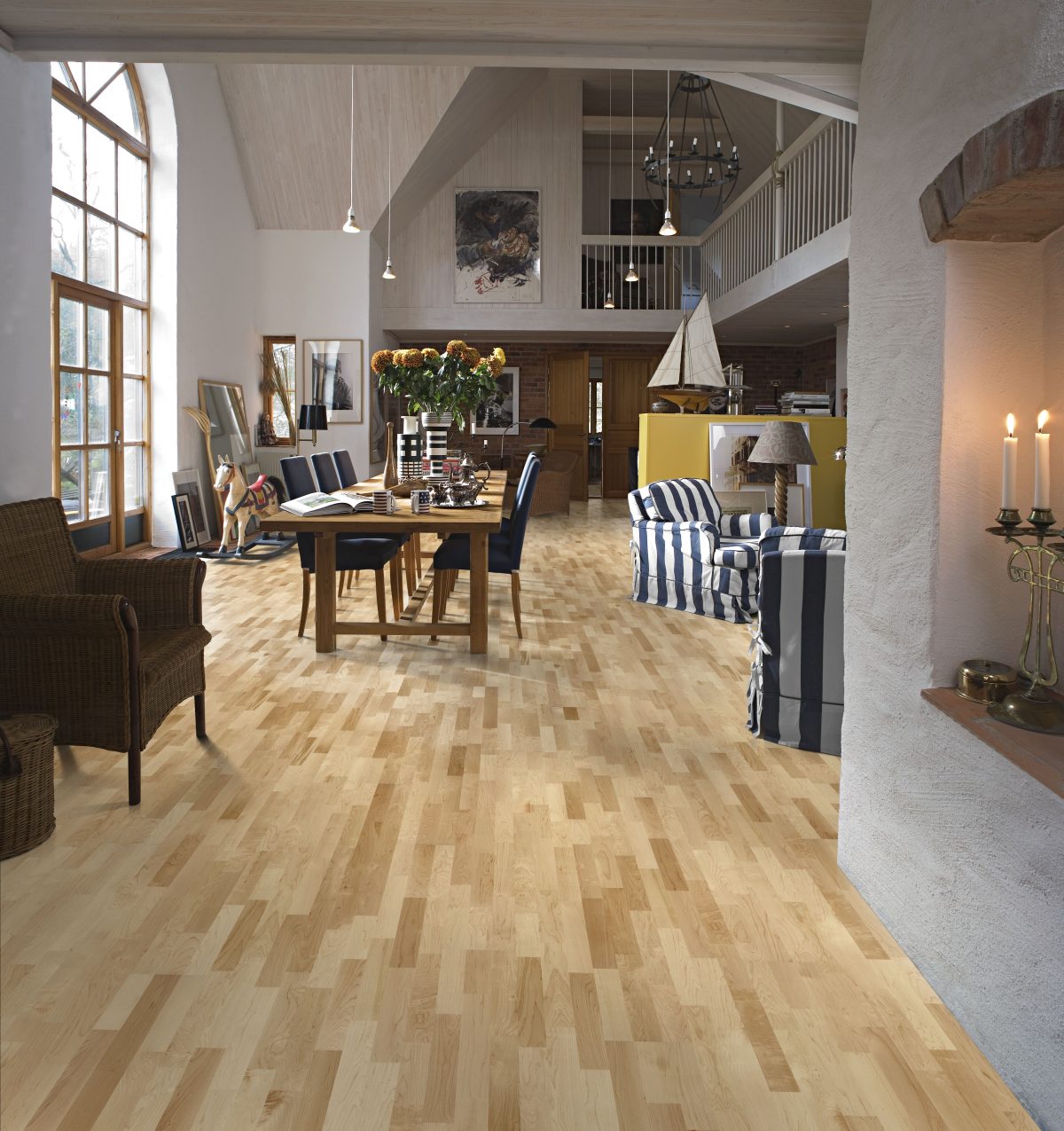 Decorated dining space with Kahrs Hard Maple Toronto Prefinished Hardwood.