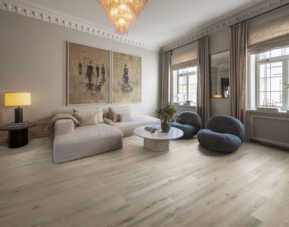 Decorated living room with Kahrs Loft White Plank Prefinished Hardwood.