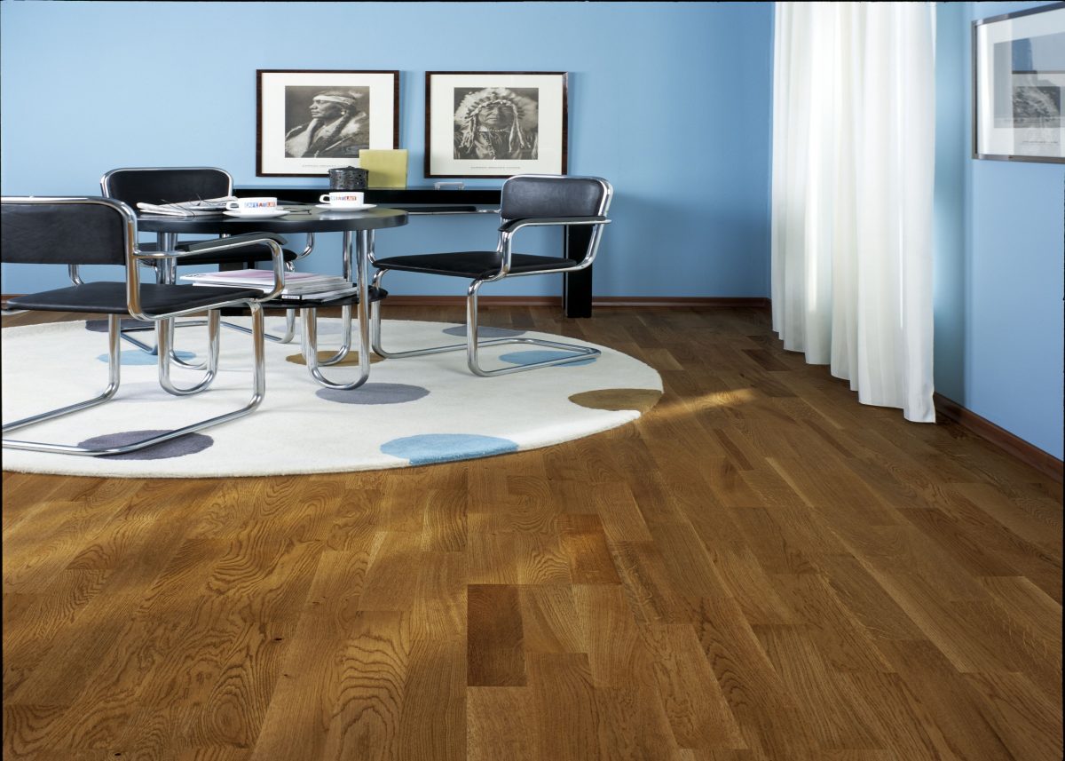 Decorated dining space with Kahrs Oak Bisbee Prefinished Hardwood.