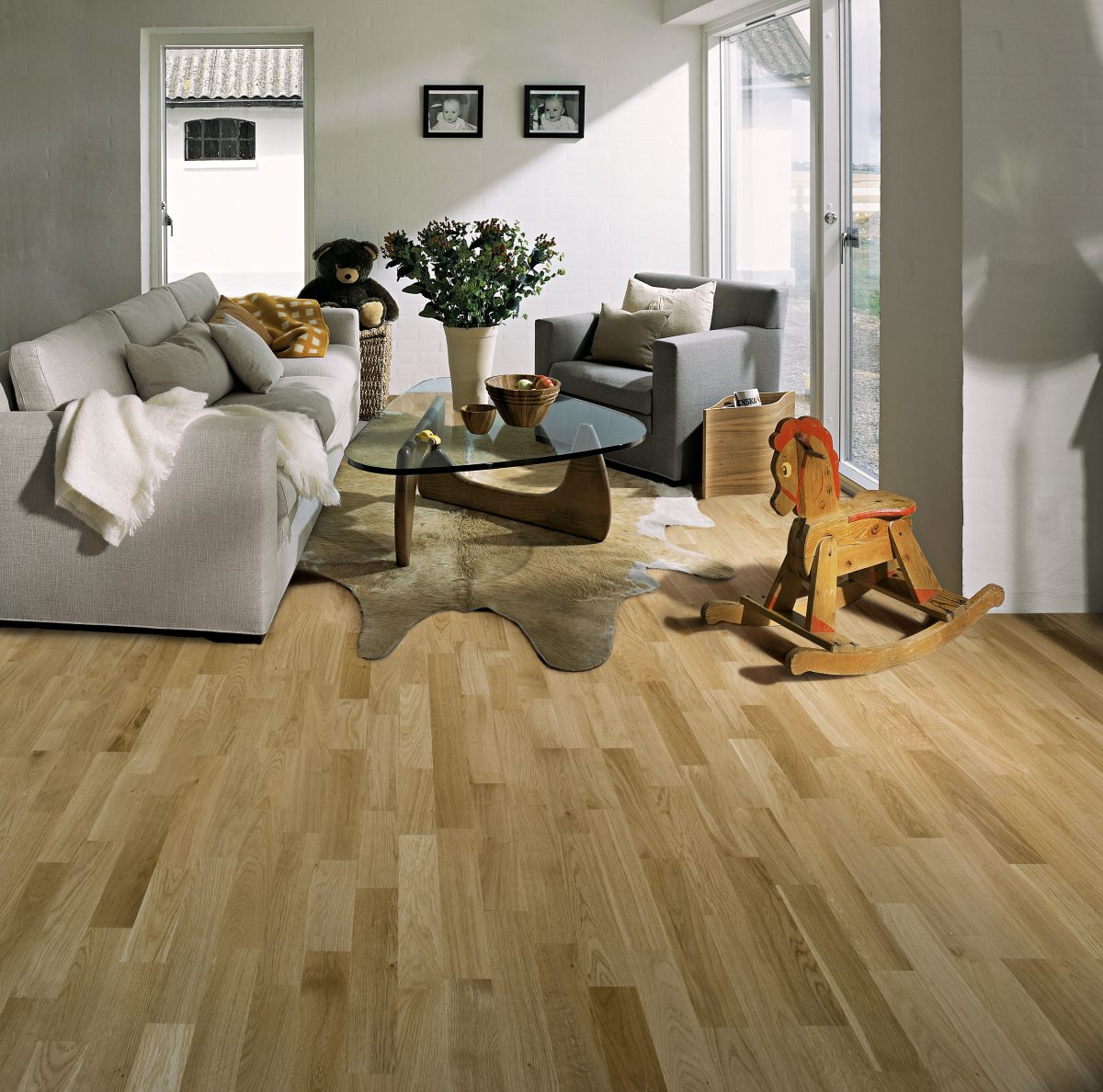 Decorated living room with Kahrs Oak Lecco Prefinished Hardwood.