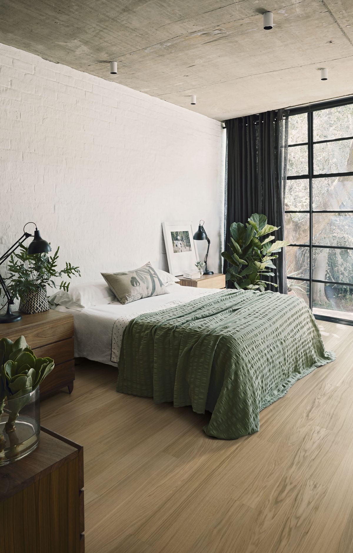 Decorated bedroom space with Kahrs Pure Oak Wide Prefinished Hardwood.