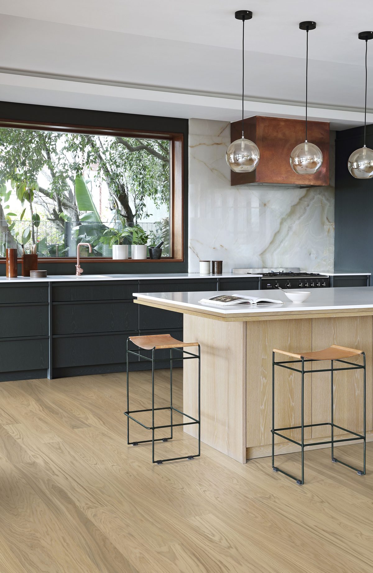 Decorated kitchen space with Kahrs Whole Grain Wide Prefinished Hardwood.