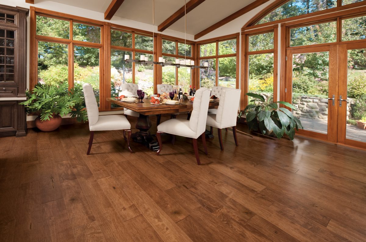 Decorated dining space with Mirage Maple Praline Character Smooth Prefinished Hardwood.