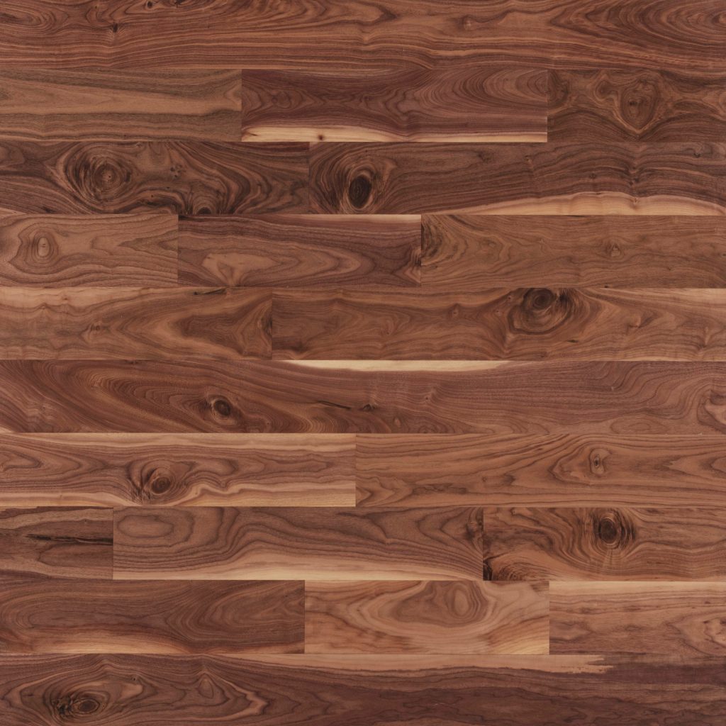 Close up of Mirage Walnut Natural Character Brushed Prefinished Hardwood.