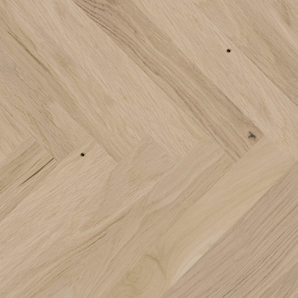 Close up of Barlinek Oak Balos Herringbone Prefinished Hardwood.