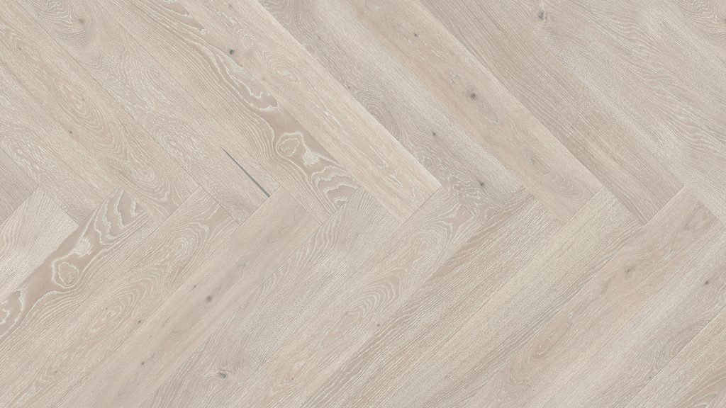 Close up of Barlinek Oak Pudding Herringbone Prefinished Hardwood.