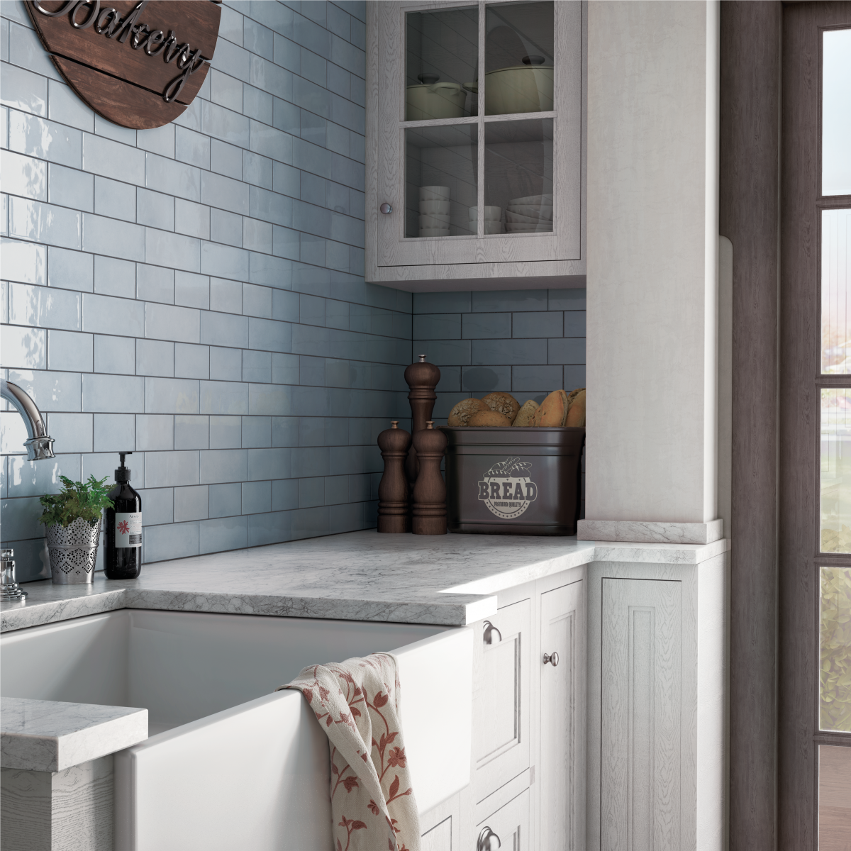 Decorated kitchen space with Equipe Cloud Tiles And Stone.