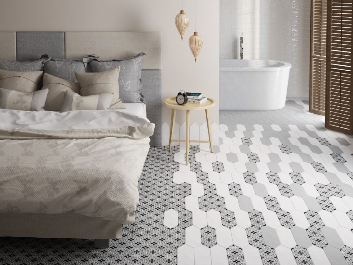 Decorated bedroom space with Equipe White Elongated Hex Tiles And Stone.