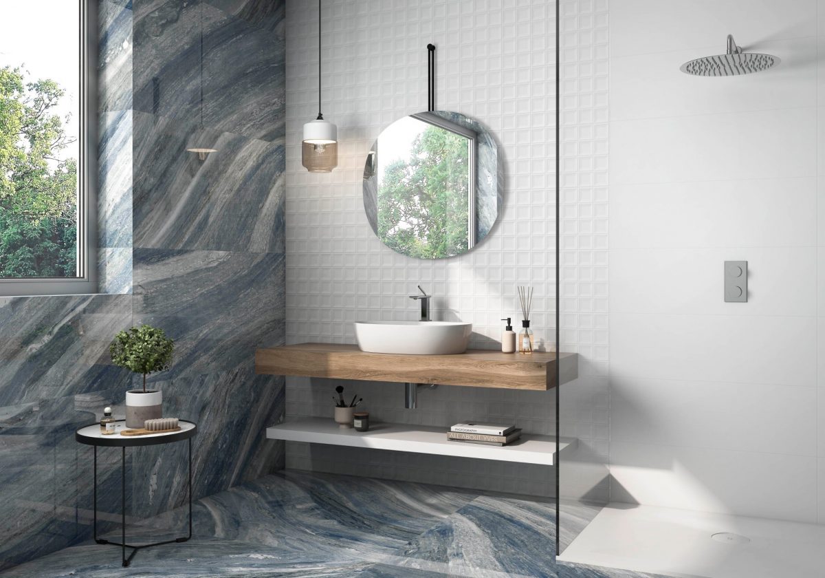 Decorated bathroom vanity with Pamesa Lux Ossola Blue Tiles And Stone.