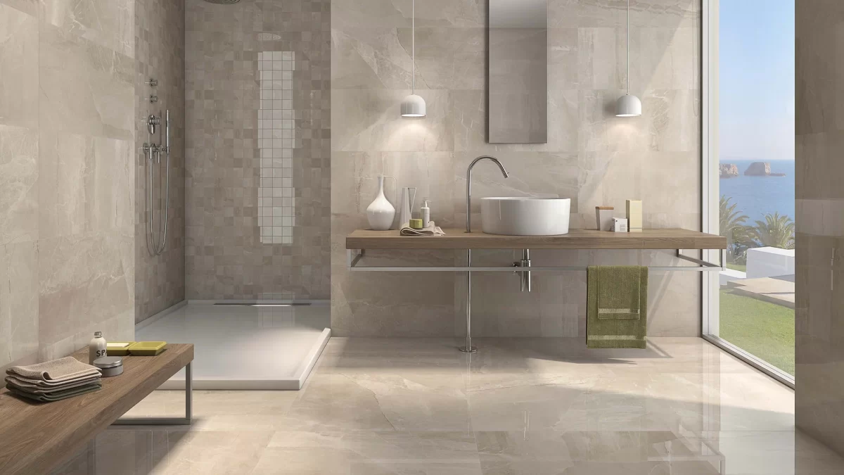 Decorated bathroom vanity with Pamesa Hueso Pulido Tiles And Stone.